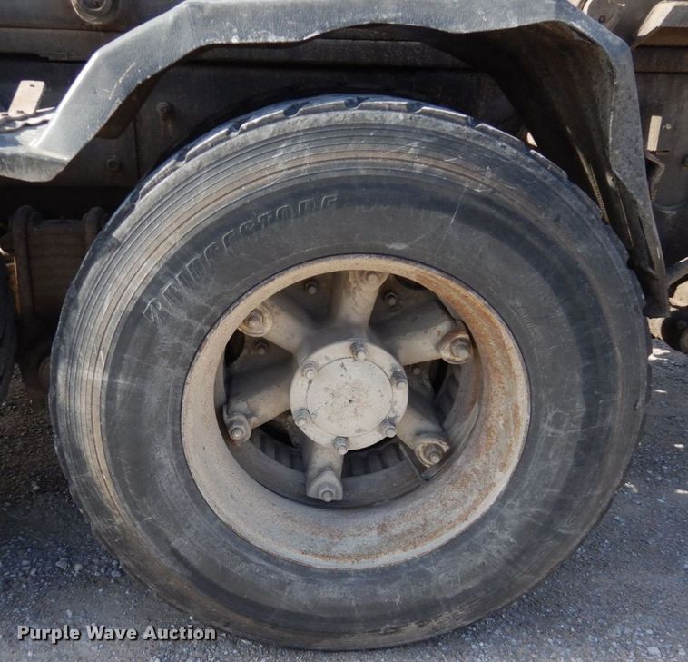 image for item DS1532 1991 Mack DM690S  roll-off container truck