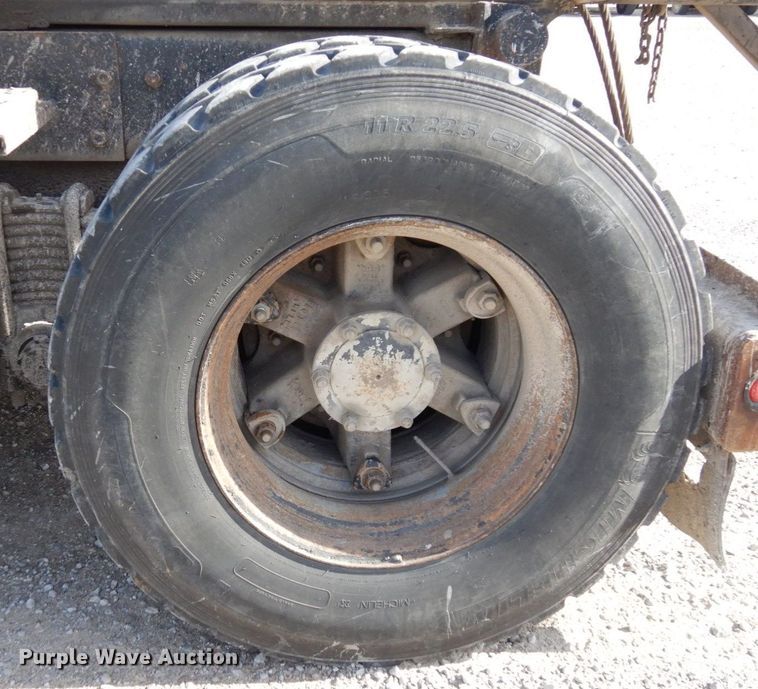 image for item DS1532 1991 Mack DM690S  roll-off container truck