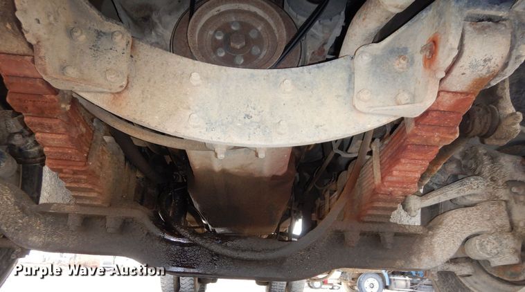 image for item DS1532 1991 Mack DM690S  roll-off container truck