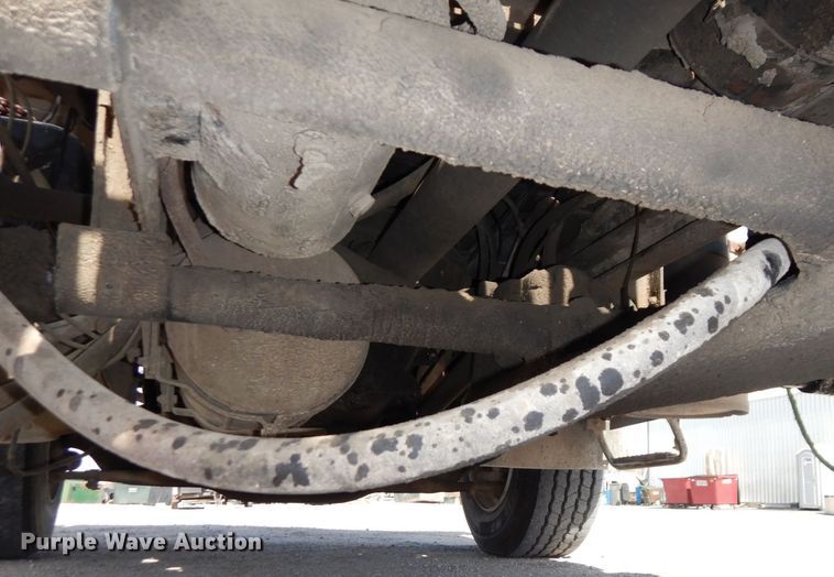 image for item DS1532 1991 Mack DM690S  roll-off container truck