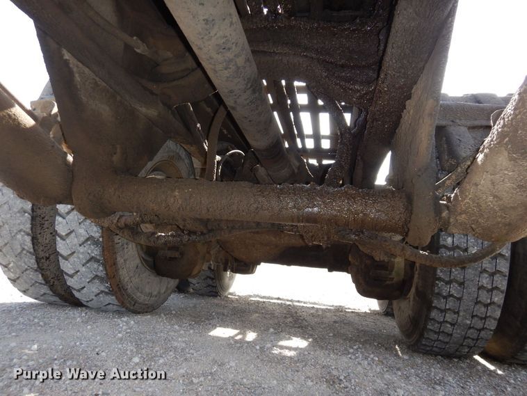 image for item DS1532 1991 Mack DM690S  roll-off container truck