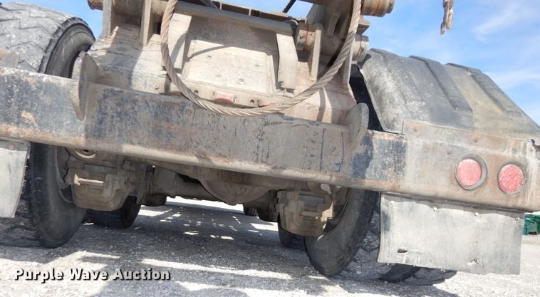 image for item DS1532 1991 Mack DM690S  roll-off container truck