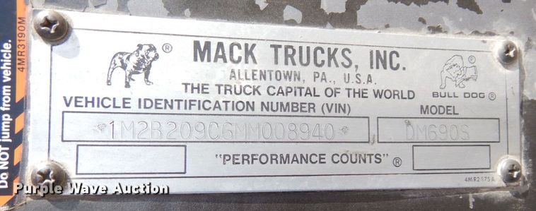 image for item DS1532 1991 Mack DM690S  roll-off container truck