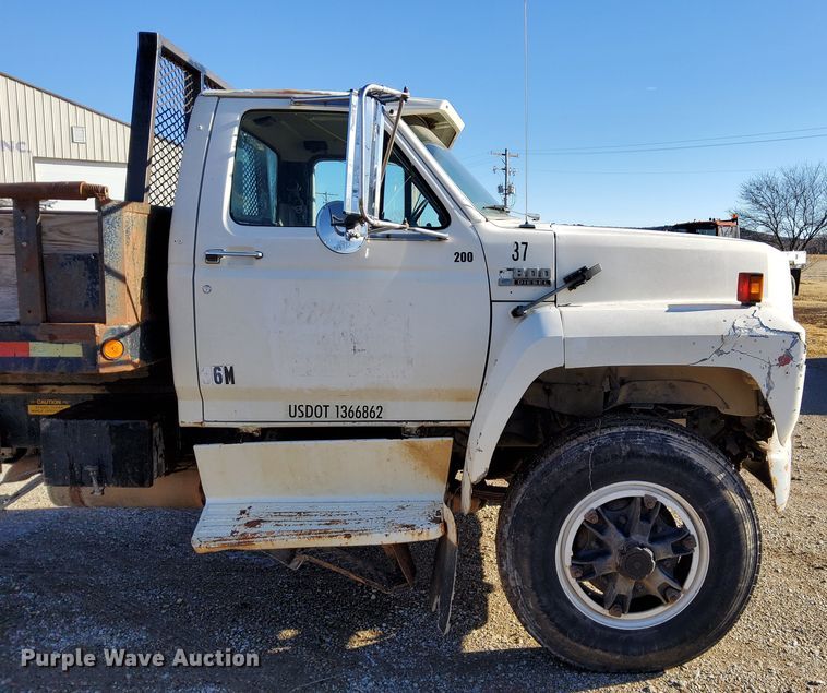image for item DL2287 1990 Ford F800  dump flatbed pickup truck