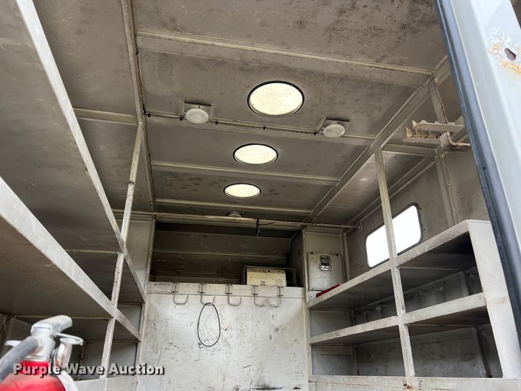 image for item JU9728 2002 Freightliner FL70  utility / service truck