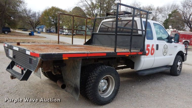 image for item HG9267 2006 Ford F350 Super Duty Lariat  SuperCab flatbed pickup truck
