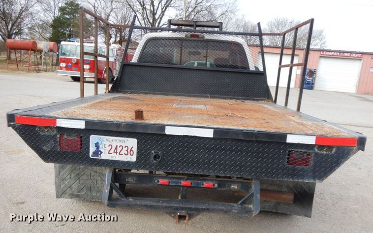 image for item HG9267 2006 Ford F350 Super Duty Lariat  SuperCab flatbed pickup truck