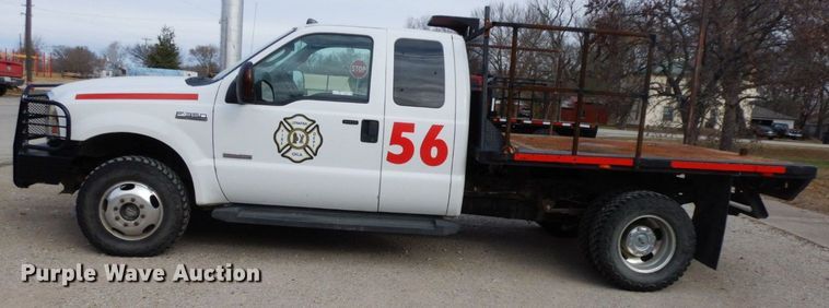 image for item HG9267 2006 Ford F350 Super Duty Lariat  SuperCab flatbed pickup truck