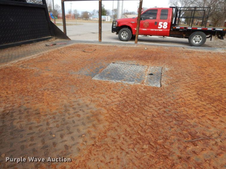 image for item HG9267 2006 Ford F350 Super Duty Lariat  SuperCab flatbed pickup truck