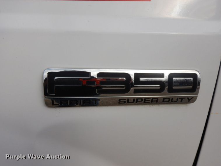 image for item HG9267 2006 Ford F350 Super Duty Lariat  SuperCab flatbed pickup truck