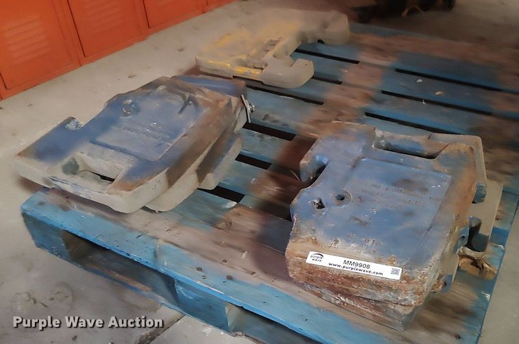 image for item MM9908 (7) Taylor Foundry Co. tractor suitcase weights