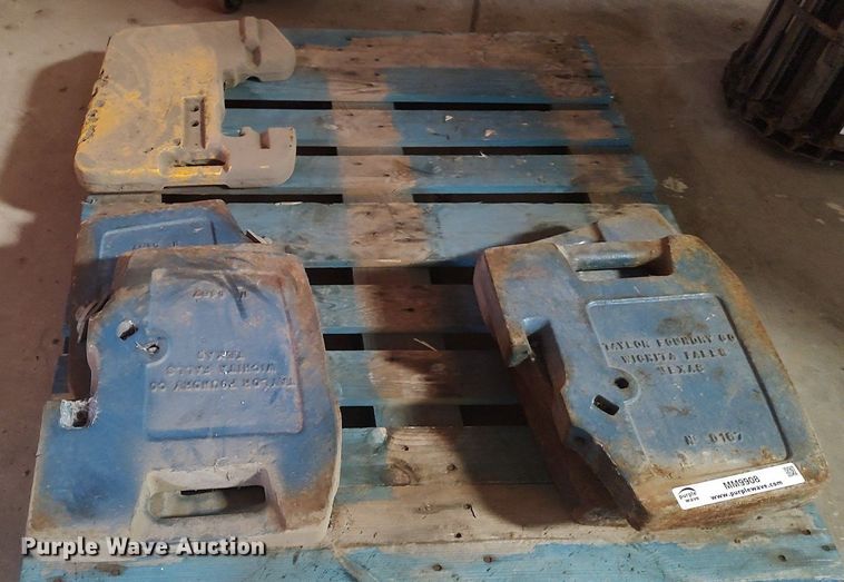 image for item MM9908 (7) Taylor Foundry Co. tractor suitcase weights