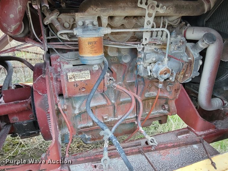 image for item HG9377 New Holland 1112  windrower