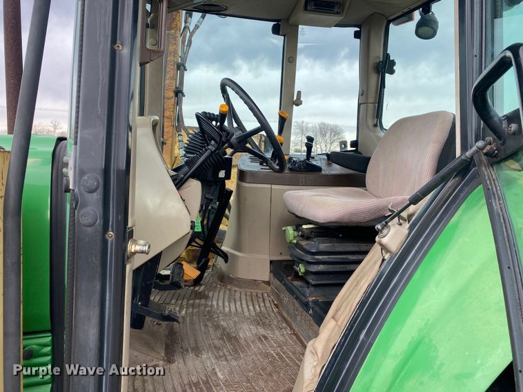 image for item JW9214 2003 John Deere 6415 tractor