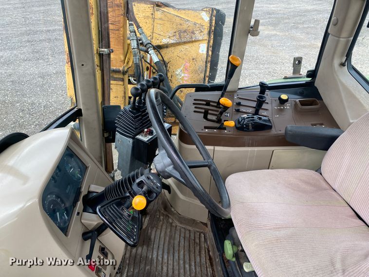 image for item JW9214 2003 John Deere 6415 tractor