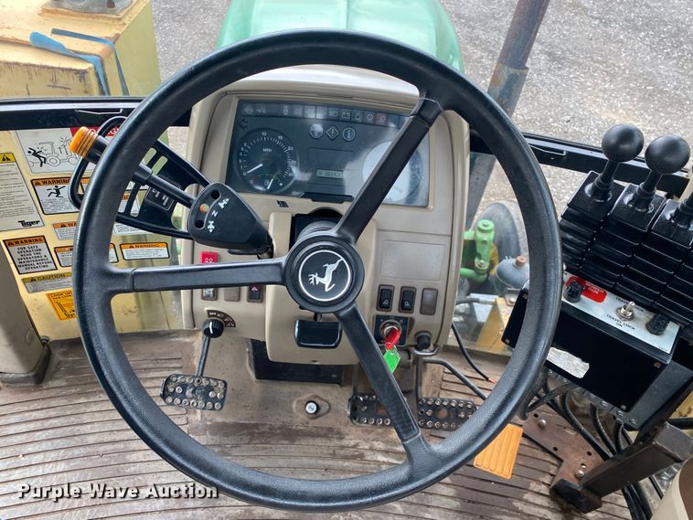 image for item JW9214 2003 John Deere 6415 tractor