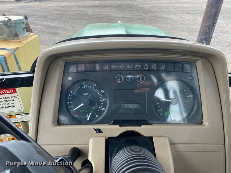 image for item JW9214 2003 John Deere 6415 tractor