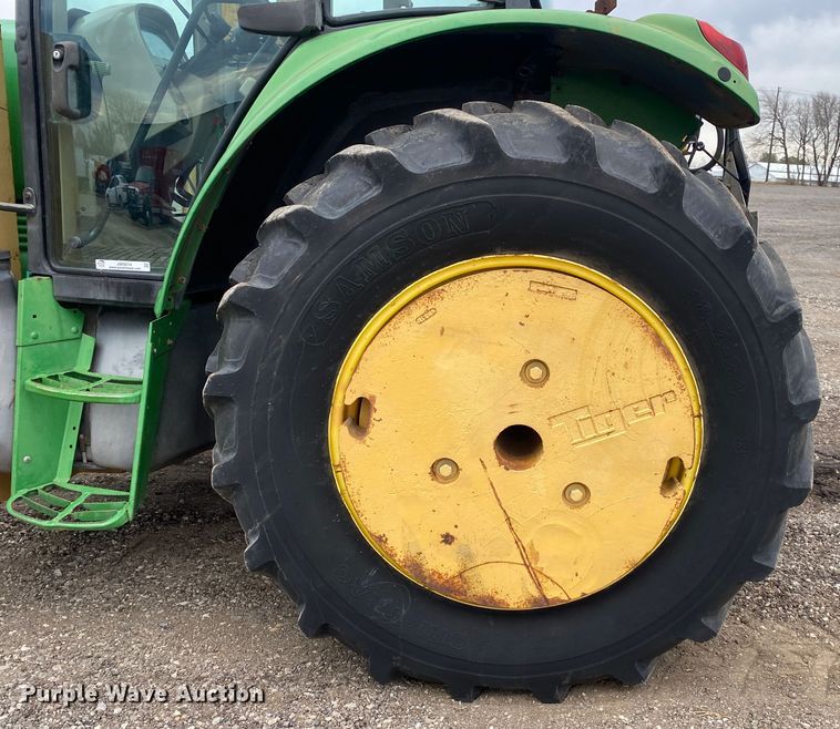 image for item JW9214 2003 John Deere 6415 tractor