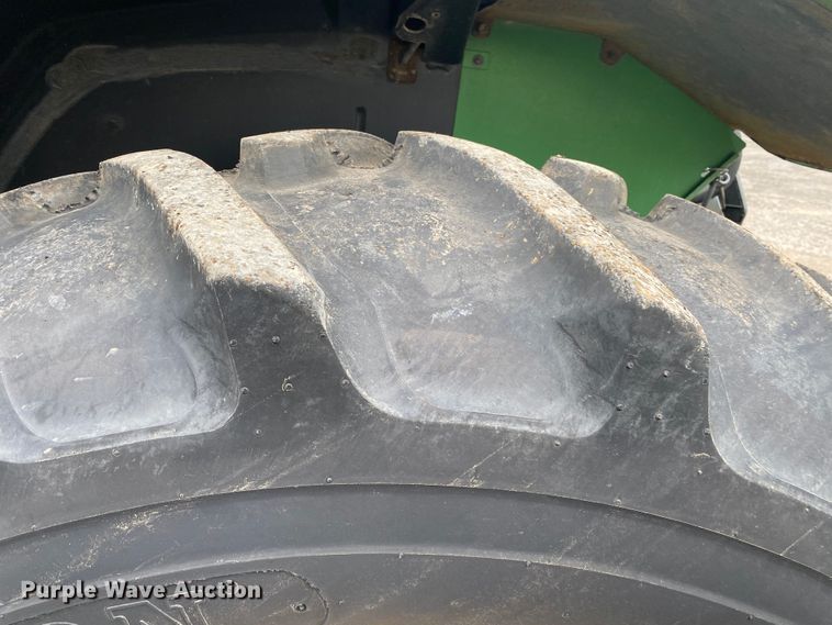 image for item JW9214 2003 John Deere 6415 tractor