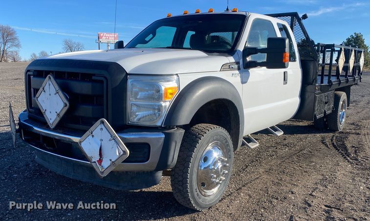 image for item JW9231 2012 Ford F550 Super Duty SuperCab flatbed truck
