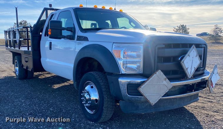 image for item JW9231 2012 Ford F550 Super Duty SuperCab flatbed truck