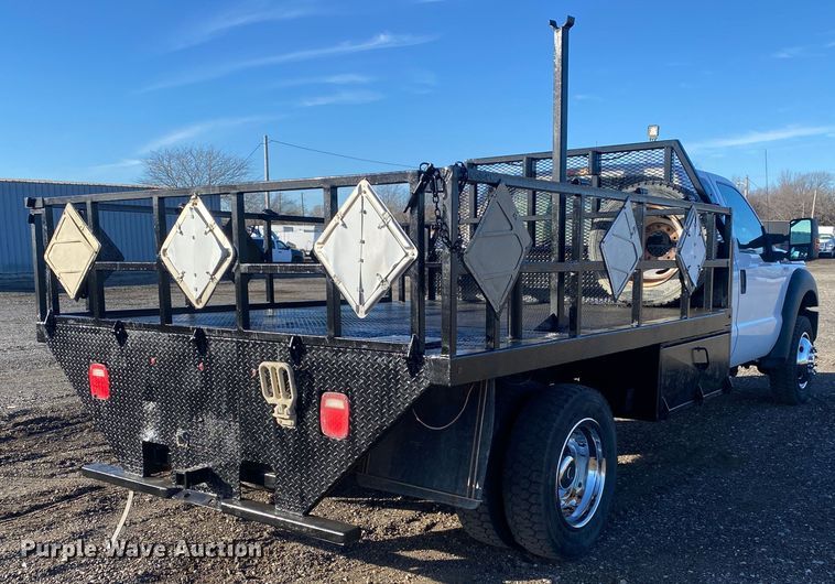 image for item JW9231 2012 Ford F550 Super Duty SuperCab flatbed truck