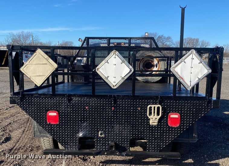 image for item JW9231 2012 Ford F550 Super Duty SuperCab flatbed truck