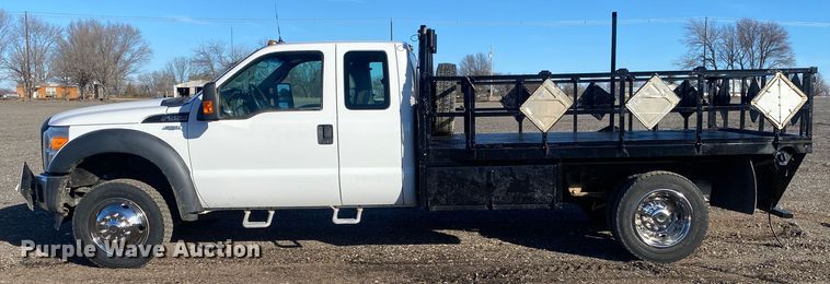 image for item JW9231 2012 Ford F550 Super Duty SuperCab flatbed truck