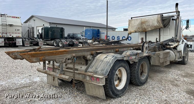 image for item MW9450 2004 Sterling L9500  roll-off container truck