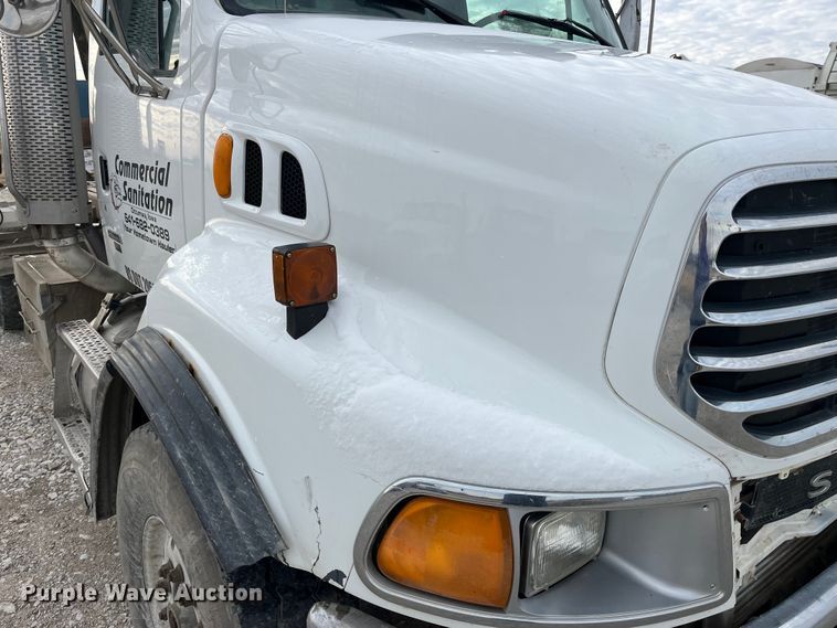 image for item MW9450 2004 Sterling L9500  roll-off container truck