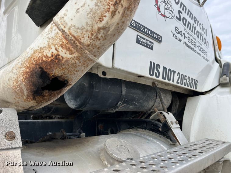 image for item MW9450 2004 Sterling L9500  roll-off container truck