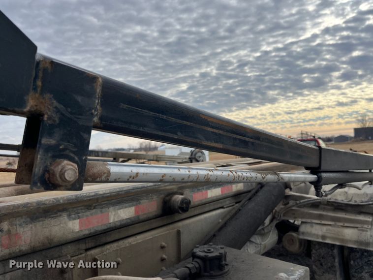 image for item MW9450 2004 Sterling L9500  roll-off container truck