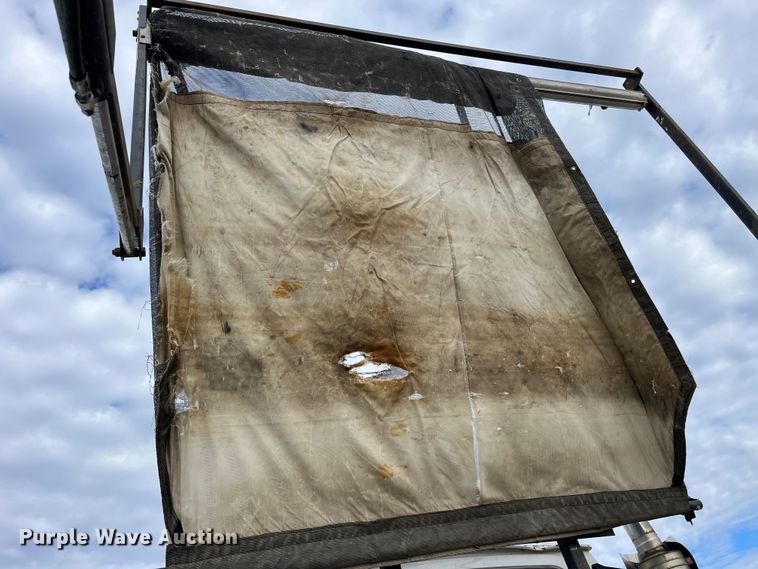 image for item MW9450 2004 Sterling L9500  roll-off container truck