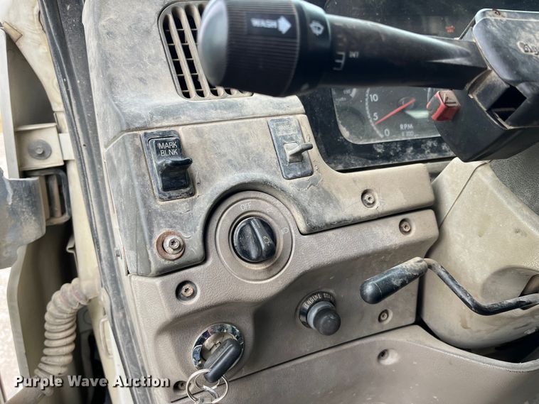 image for item MW9450 2004 Sterling L9500  roll-off container truck