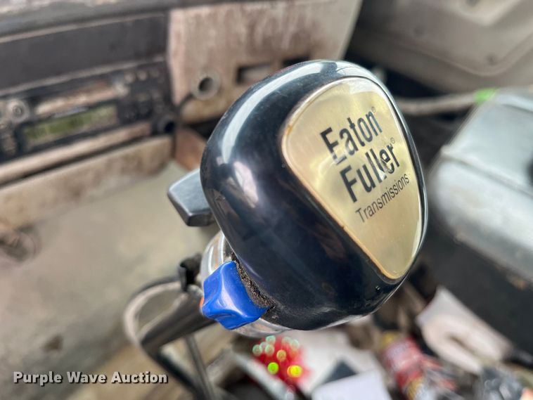 image for item MW9450 2004 Sterling L9500  roll-off container truck