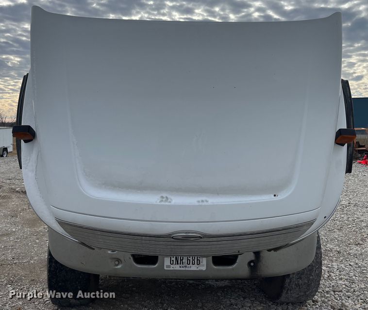 image for item MW9450 2004 Sterling L9500  roll-off container truck