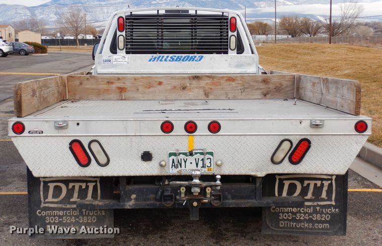 image for item DF8296 2005 Ford F450 Super Duty  Crew Cab flatbed truck