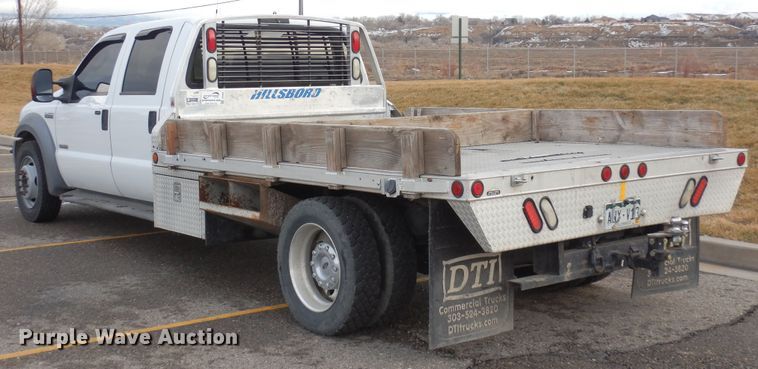 image for item DF8296 2005 Ford F450 Super Duty  Crew Cab flatbed truck
