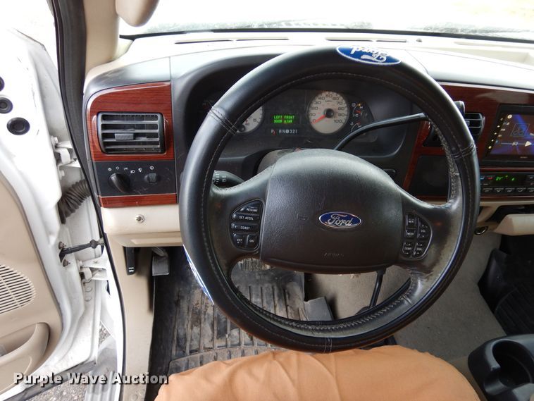 image for item DF8296 2005 Ford F450 Super Duty  Crew Cab flatbed truck