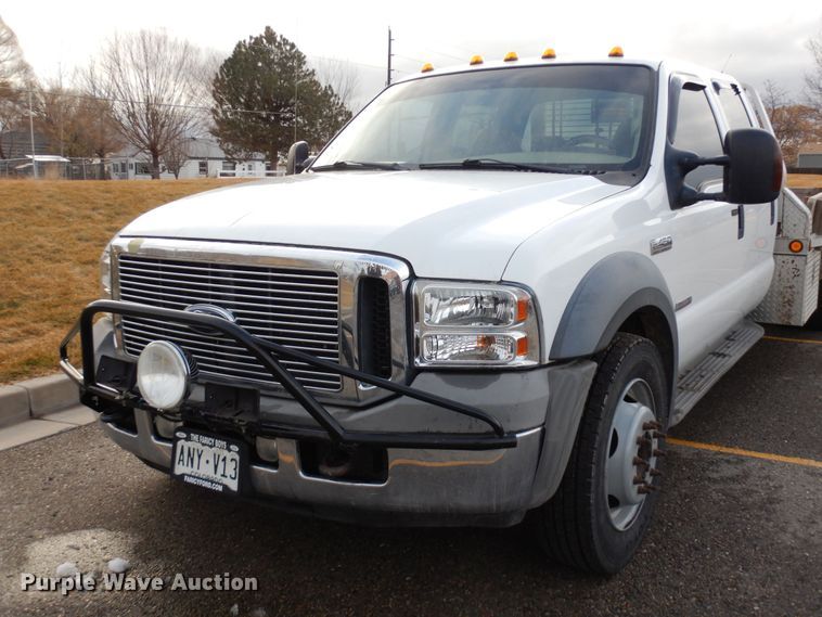 image for item DF8296 2005 Ford F450 Super Duty  Crew Cab flatbed truck