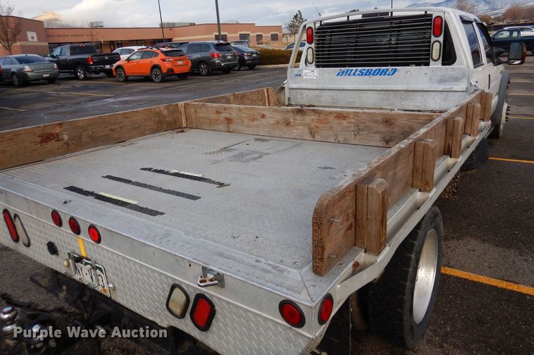 image for item DF8296 2005 Ford F450 Super Duty  Crew Cab flatbed truck