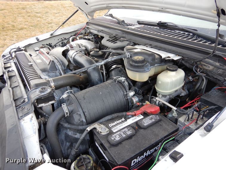 image for item DF8296 2005 Ford F450 Super Duty  Crew Cab flatbed truck