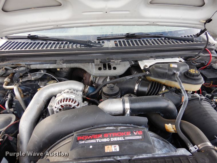 image for item DF8296 2005 Ford F450 Super Duty  Crew Cab flatbed truck