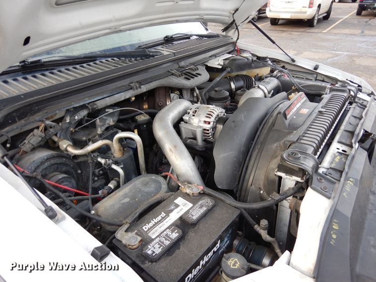 image for item DF8296 2005 Ford F450 Super Duty  Crew Cab flatbed truck