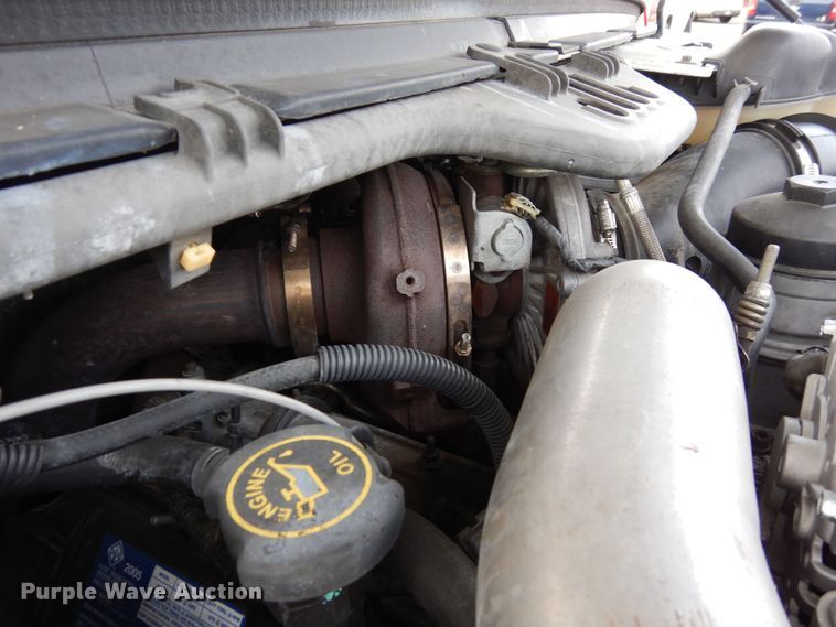 image for item DF8296 2005 Ford F450 Super Duty  Crew Cab flatbed truck