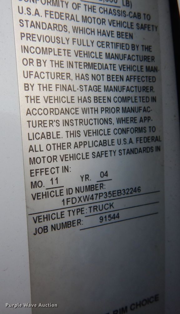 image for item DF8296 2005 Ford F450 Super Duty  Crew Cab flatbed truck