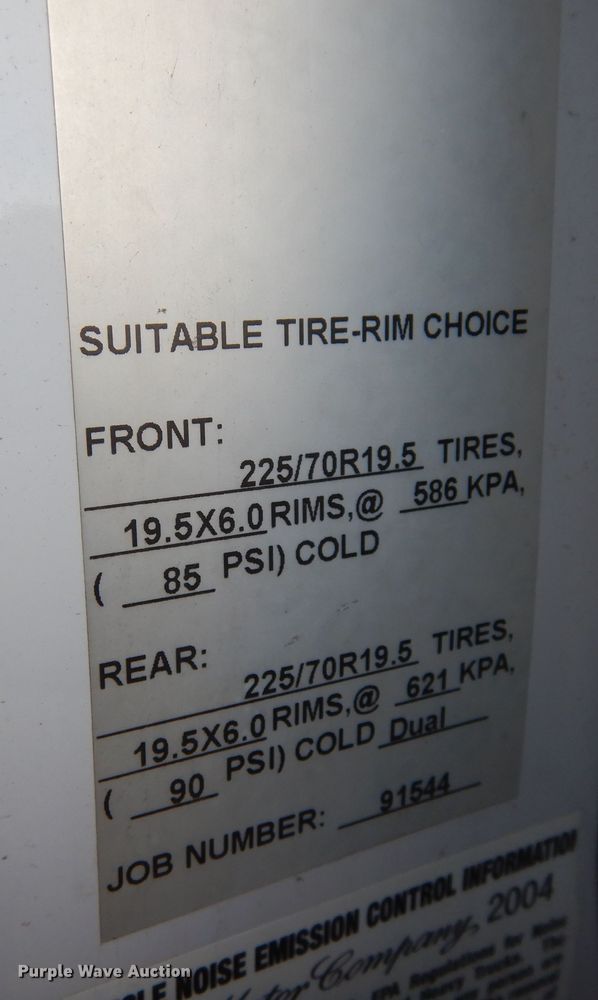 image for item DF8296 2005 Ford F450 Super Duty  Crew Cab flatbed truck