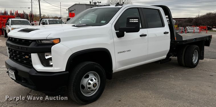 image for item DQ1953 2021 Chevrolet Silverado 3500HD  Crew Cab flatbed pickup truck