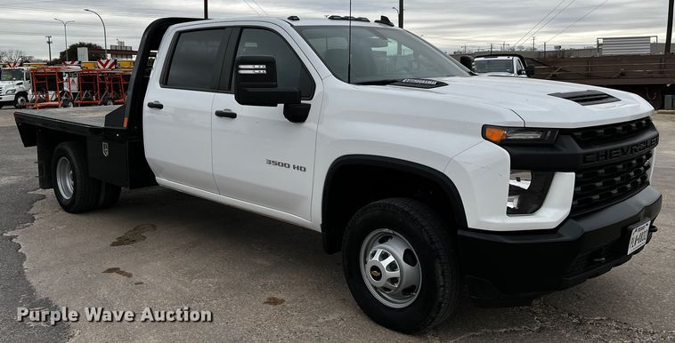 image for item DQ1953 2021 Chevrolet Silverado 3500HD  Crew Cab flatbed pickup truck