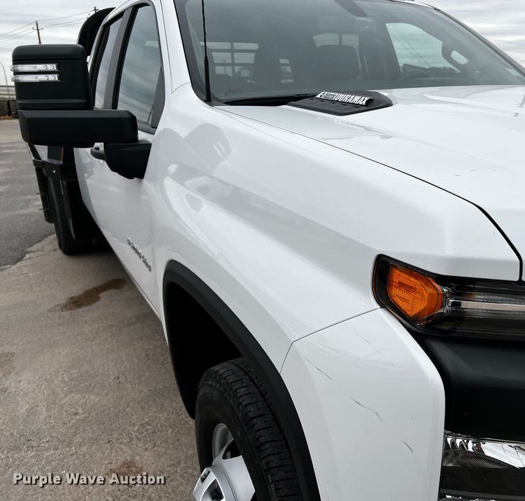 image for item DQ1953 2021 Chevrolet Silverado 3500HD  Crew Cab flatbed pickup truck